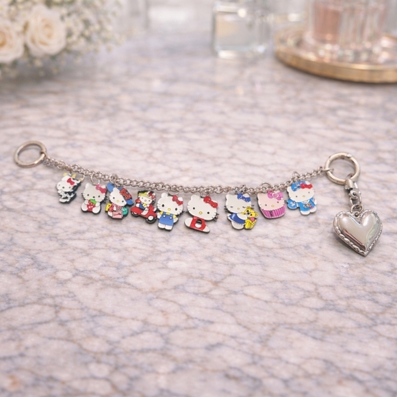 Hello Kitty Other - Hello Kitty Silver Bag Charm Chain With Multicolor Hello Kitty Charms.